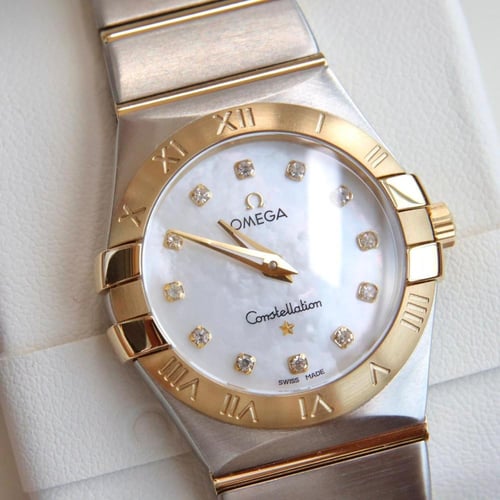 ساعة كونستليشن فولاذ مطلي بذهب من أوميغا