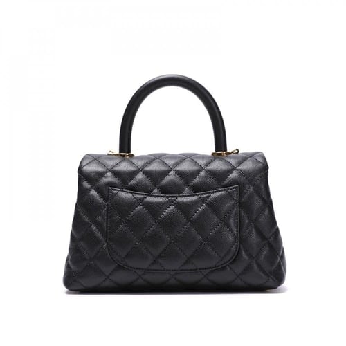 حقيبة شانيل كوكو هاندل بحجم 24 بمقبض عنابي/أسود