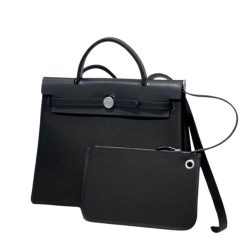 حقيبة هيرباج توال 31 بقماش وجلد أسود من ايرميز