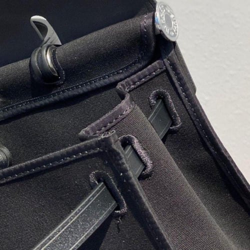 حقيبة هيرباج توال 31 بقماش وجلد أسود من ايرميز