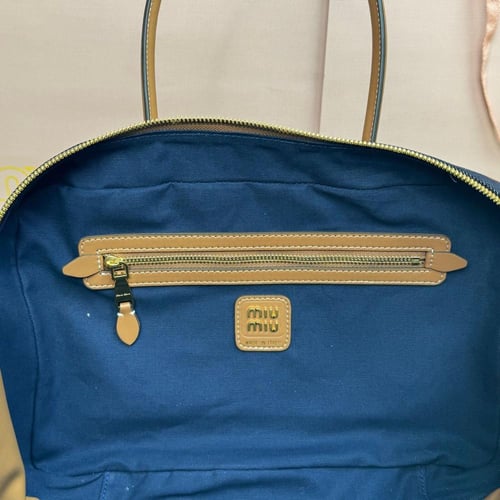 حقيبة توب هاندل Beau من الجلد من ميو ميو