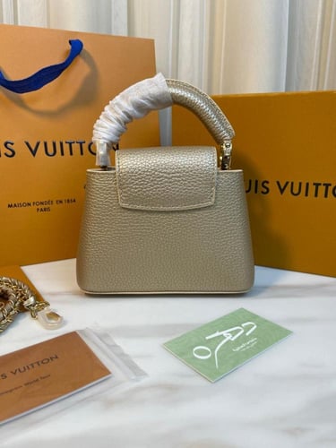 حقيبة لويس فويتون كابوسين نانو- برونزي مع ذهبي مقا...