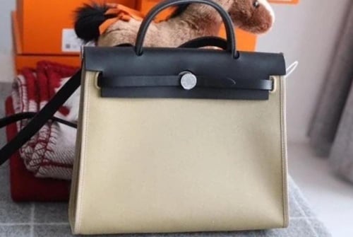 حقيبة هيرباج توال 31 بقماش وجلد أسود من ايرميز