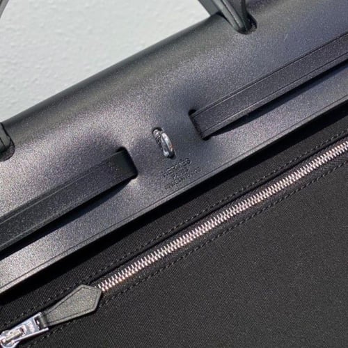 حقيبة هيرباج توال 31 بقماش وجلد أسود من ايرميز