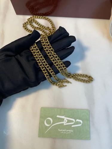 حقيبة مارمونت صغيرة على شكل نصف قمر بشعار GG