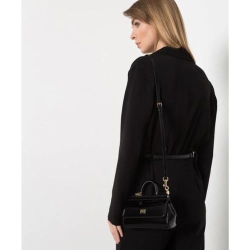 حقيبة سيسيلي ميني 18 من الجلد الأسود اللامع من دول...