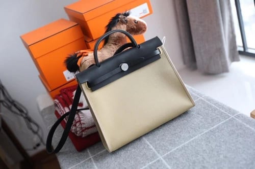 حقيبة هيرباج توال 31 بقماش وجلد أسود من ايرميز