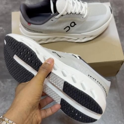 ON Cloudsurfer Next running trainers in all white