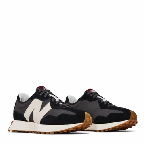 New Balance 327 trainers in black and grey