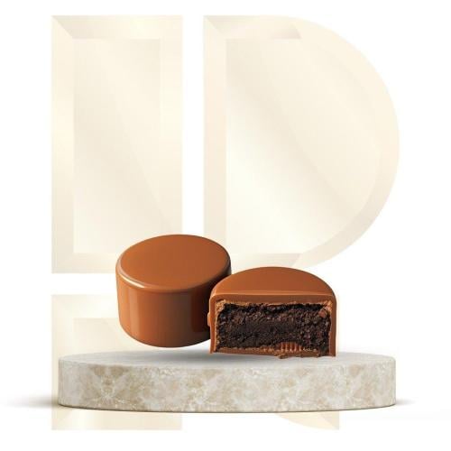 A kilogram of open VIP chocolate (short cylindrica...