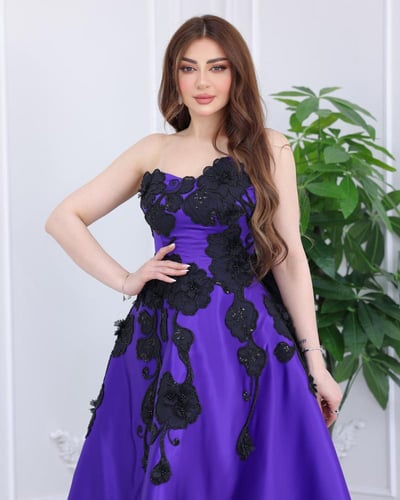 فستان سهرة بورود بارزة