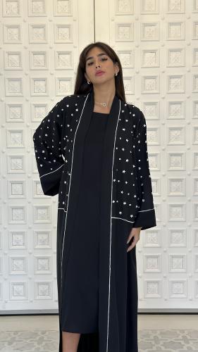 Embroidered silk abaya.