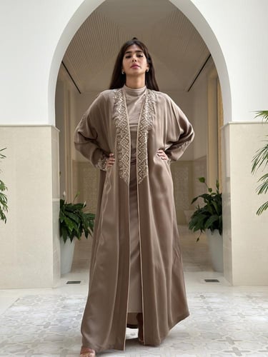 ‏Elegant silk abaya with embroidery