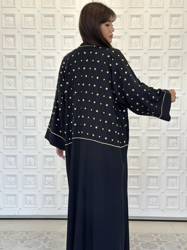 Embroidered silk abaya.