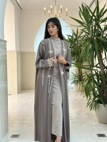 Washed silk abaya with embroidery.