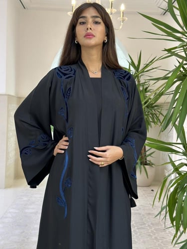 Luxurious abaya with handmade embroidery.
