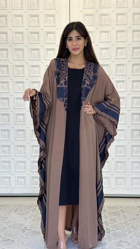Embroidered silk abaya.