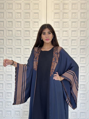 Embroidered silk abaya.