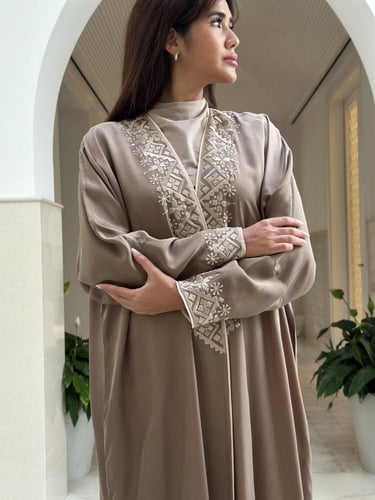 ‏Elegant silk abaya with embroidery
