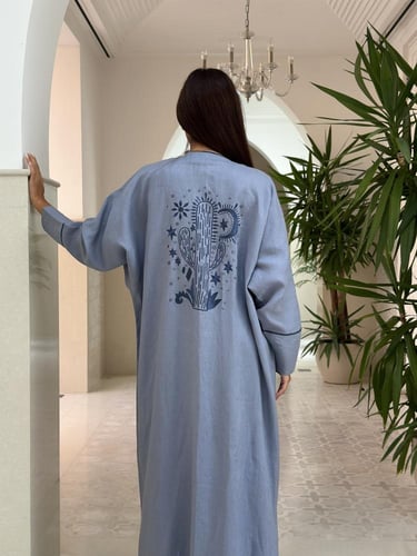 Linen abaya with cactus embroidery.