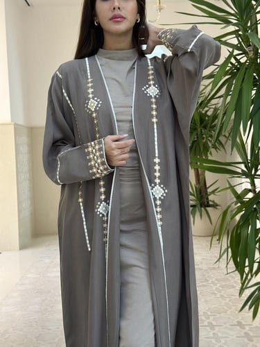 Washed silk abaya with embroidery.