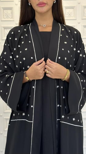 Embroidered silk abaya.