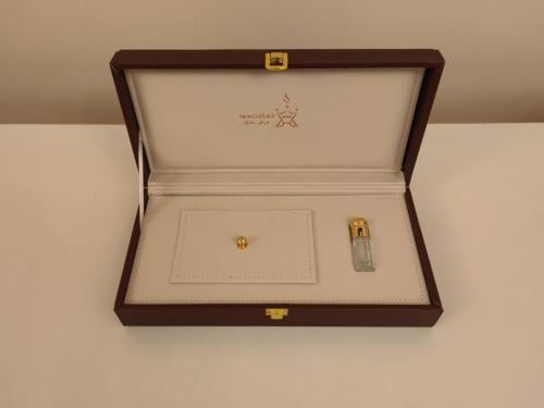 شنطة جلد مستطيلة (١ ربع تولة + أوقية)