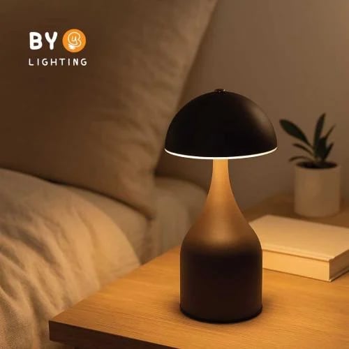 A rechargeable table lamp with an elegant black se...