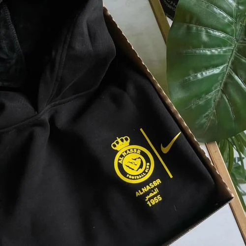 Al Nassr FC 2024 Logo Hoodie - بلوفر نادي النصر بش...
