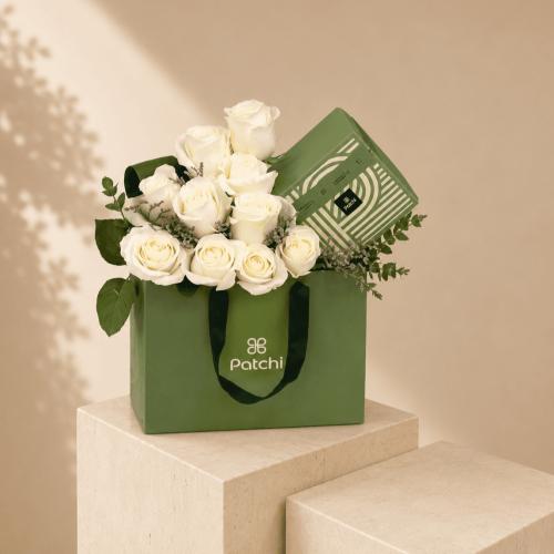 White rose arrangement with Patchi