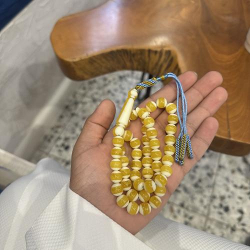 Amber-colored clay rosary - distinctive color