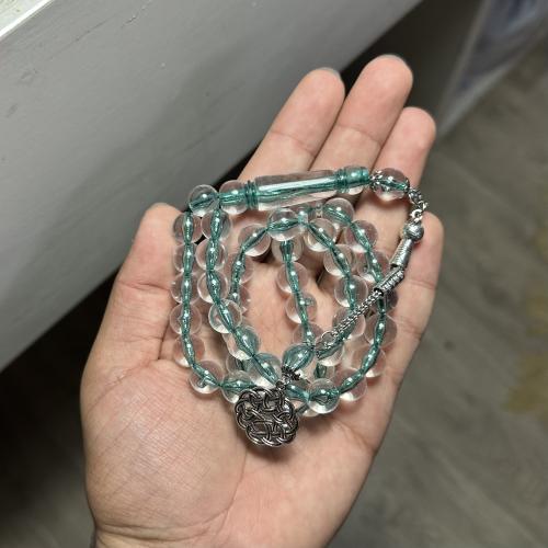 Green transparent plastic rosary