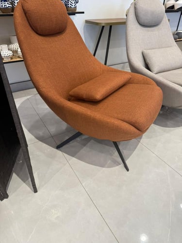 كرسي مريح دوار لون برتقالي