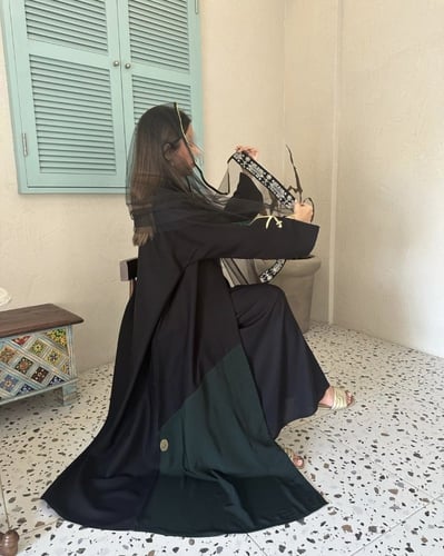 عبايه ( انا سعودي )