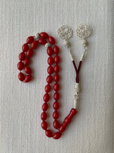 سبحة تراب كهرمان مزينة بخيوط الفضة الخالصة