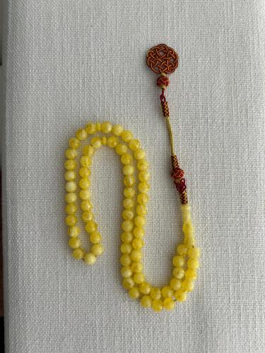 سبحة تراب كهرمان مشغولة يدوياً