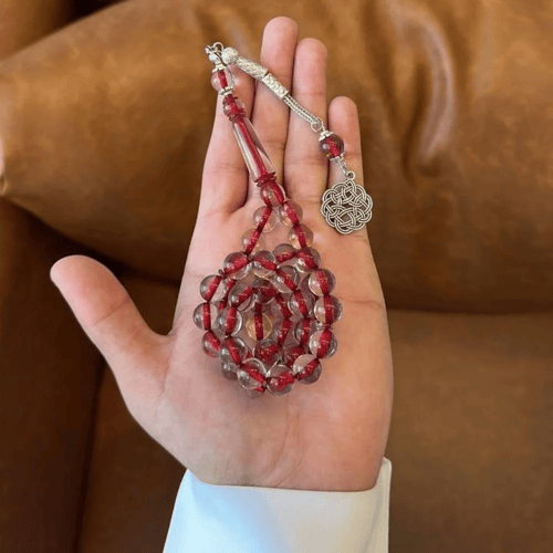 سبحة بكلايت شفافة خيط احمر