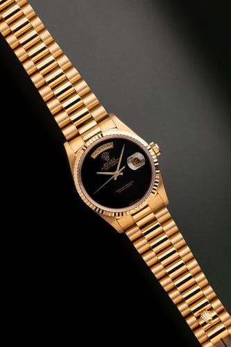 ساعة رولكس ذهبي