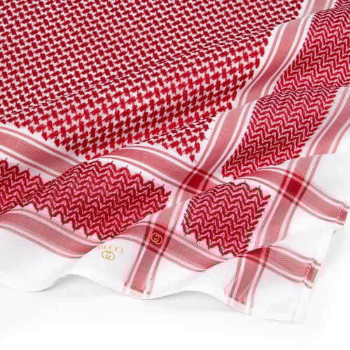 شماغ قوتشي الذهبي إنجليزي