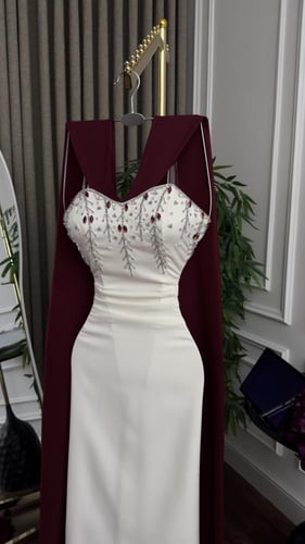 فستان طويل تفته بتطريز يدوي