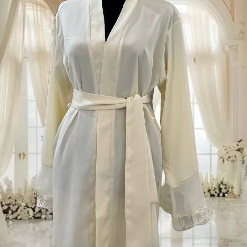 روب عروس مطرز بالاسم