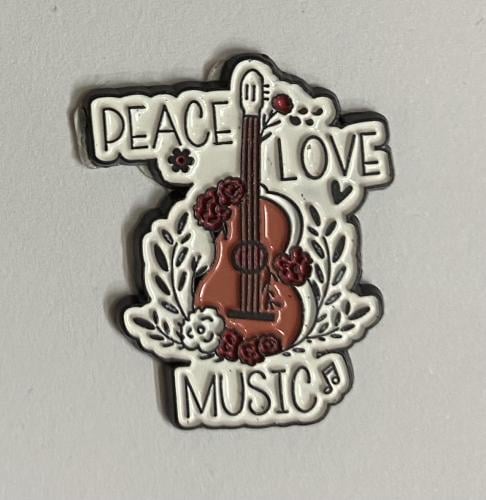 ستيكر معدني peace love music