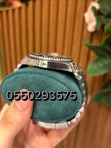 ساعة رولكس GMT بروس واين كوبي سويس