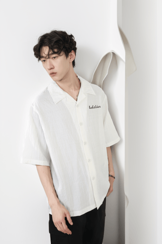 قميص اوفر سايز بطباعة خلفية من تومر