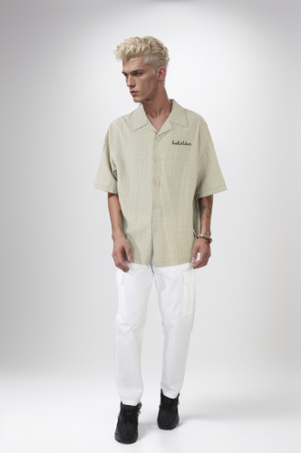 قميص اوفر سايز بطباعة خلفية من تومر