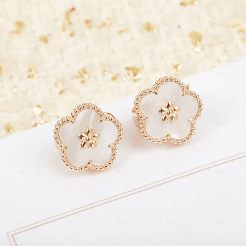 حلق فان كليف لكي سبينغ وردة من مجموعة الدعسوقة