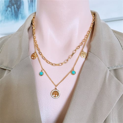 سلسال مرصع بحجر الفيروز مع نعليقات على شكل شجرة مط...