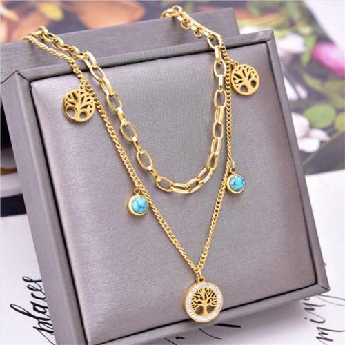 سلسال مرصع بحجر الفيروز مع نعليقات على شكل شجرة مط...