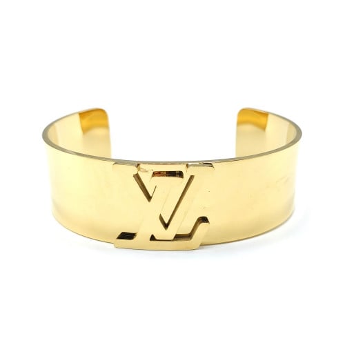 اسوارة ال في قيد مفتوحة من الاسفل مطلية ذهب بتصميم...