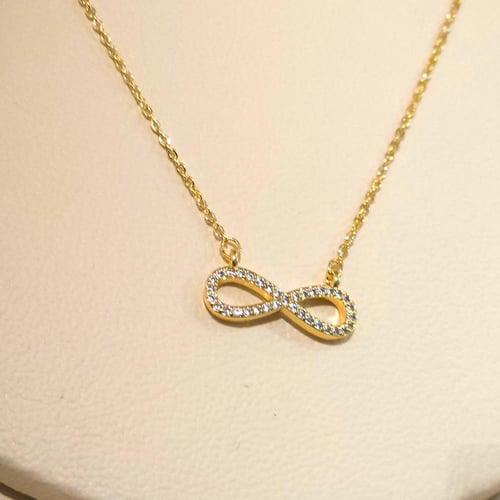 سلسال انفنتي ذهبي زركون